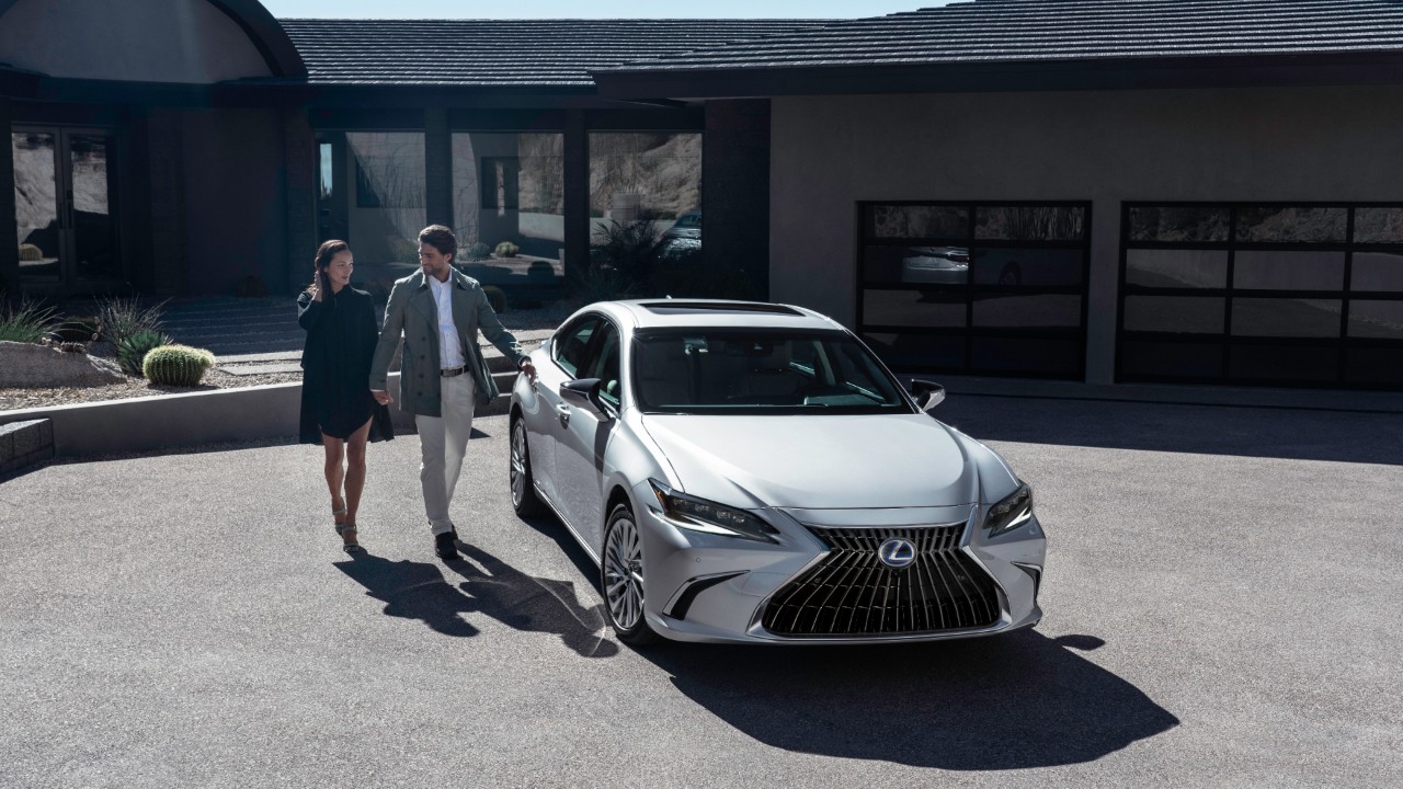 A Lexus ES parked outside a building 