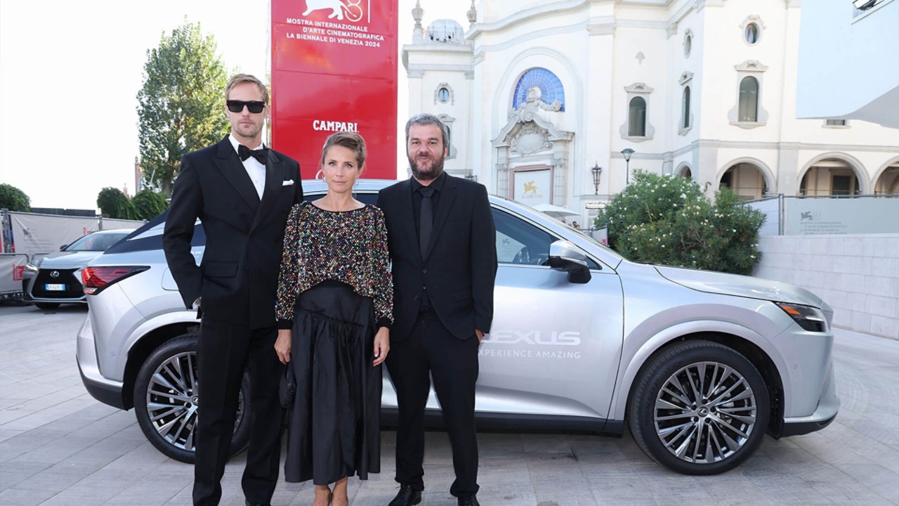 Alexander Skarsgård, Tuva Novotny and Christos Nikou stood by a Lexus at the 81st Venice film festival